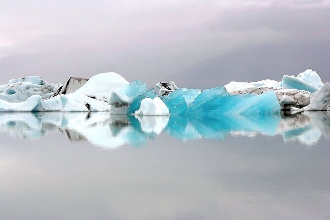 2-Day Blue Ice Cave, Glacier Lagoon and South Coast - Small Group - Blue Ice Cave: the superjeep ride and why “blue” is never the same twice