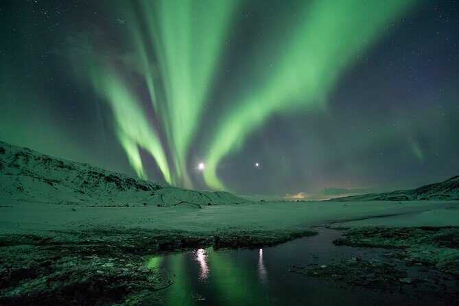 Cozy Northern Lights Tour with Icelandic Treats - The First Stop and the Waiting Game: Reykjavik to Darker Skies