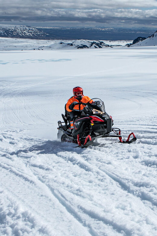 From Geysir: Snowmobiling & Ice Cave on Langjökull Glacier - One hour on Langjökull at 1450 meters: the ride you’ll remember