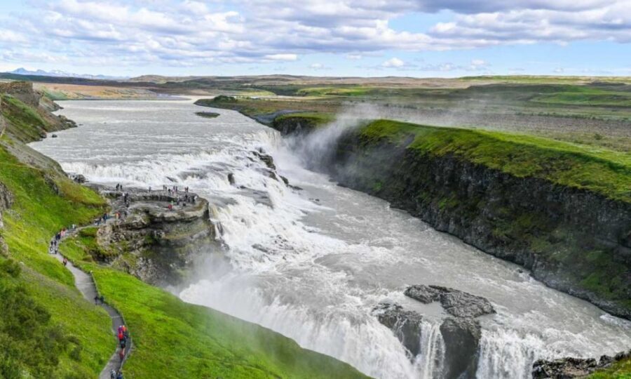 From Reykjavik: Full Day Whale Watching & Golden Circle Tour - The not-too-glamorous part: switching from boat to bus