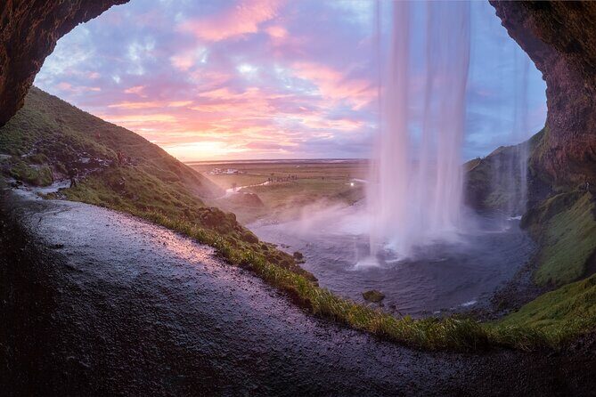 From Reykjavik: Glacier Hike, South Coast and Waterfalls Day Trip - Reynisfjara black sand beach: basalt columns and Reynisdrangar