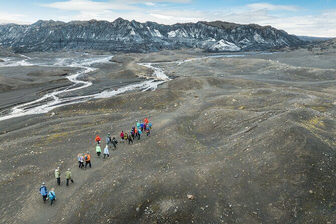 From Reykjavik: Katla Ice Cave and South Coast Day Tour - Reynisfjara (Vikurfjara): Black Sand, Basalt Columns, and Real Ocean Power