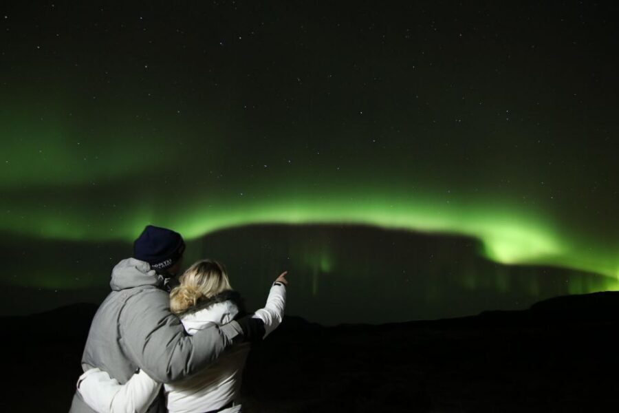 From Reykjavik: Northern Lights Tour with Hot Cocoa & Photos - Weather-driven aurora hunting from Reykjavik