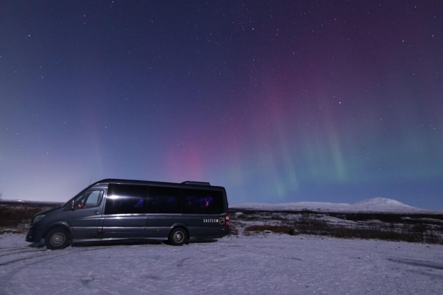 From Reykjavik: Northern Lights Tour with Hot Cocoa & Photos - First stop energy: photos and a bit of sightseeing