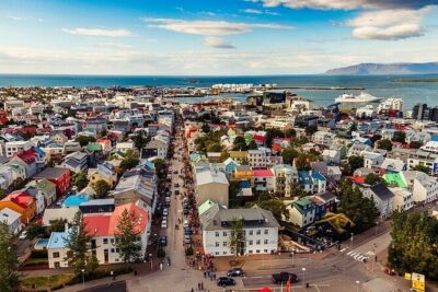 Helicopter Tour: Reykjavik City with landing at Mount Esja - Reykjavik from above: roofs, parks, and the harbor view