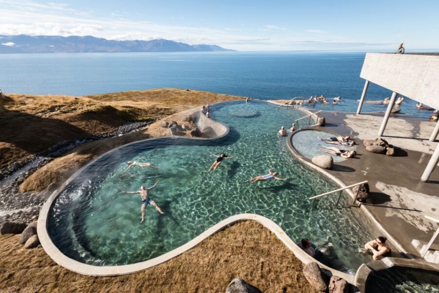 Husavik: GeoSea Geothermal Baths Entrance Ticket - Steam room breaks and the swim-up bar experience