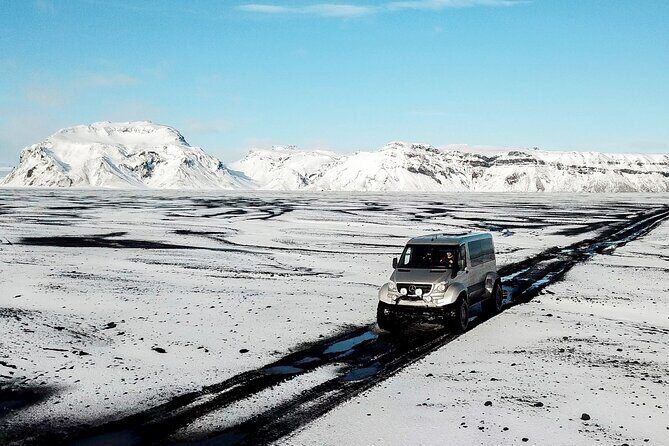 Katla Ice Cave & South Coast Day Tour from Reykjavik - On Mýrdalsjökull Glacier: crampons, helmets, and a real guide behind the ice cave