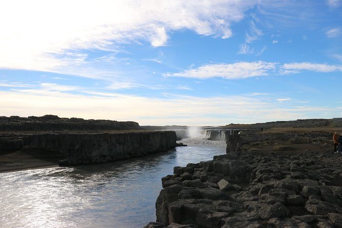 Lake Mývatn and Powerful Dettifoss Day Tour from Akureyri - Stop 3: Námaskarð Hverir Hot Mud Pits and Steam-Soaked Reality