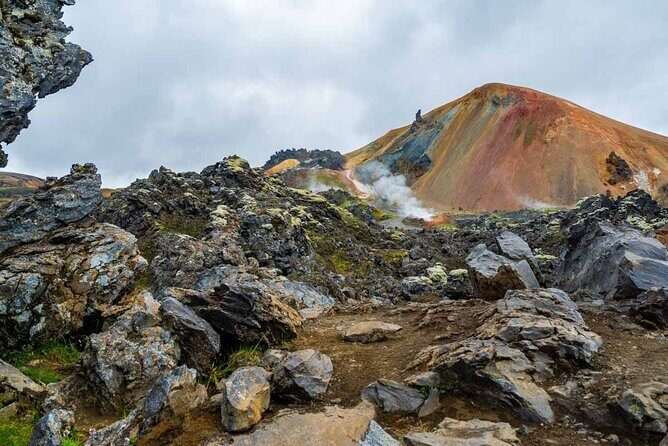 Landmannalaugar Hiking, Haifoss Waterfall and Hot Springs Tour - Stop 1: Hjálparfoss and Its Turquoise Pool