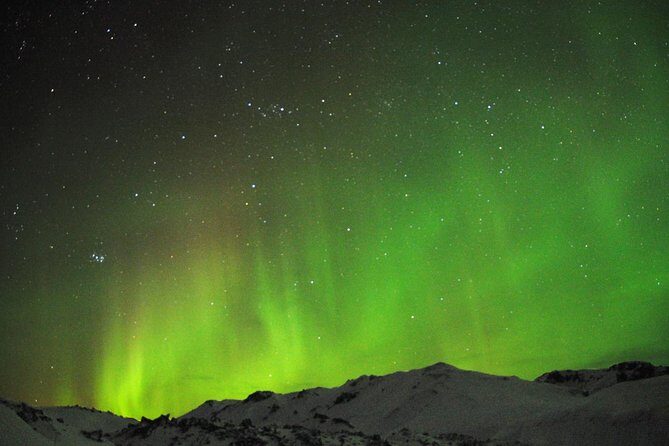 Northern Lights Minibus Tour with Hot Cocoa, Blankets & Photos - Pickup timing and what to expect when it’s dark outside