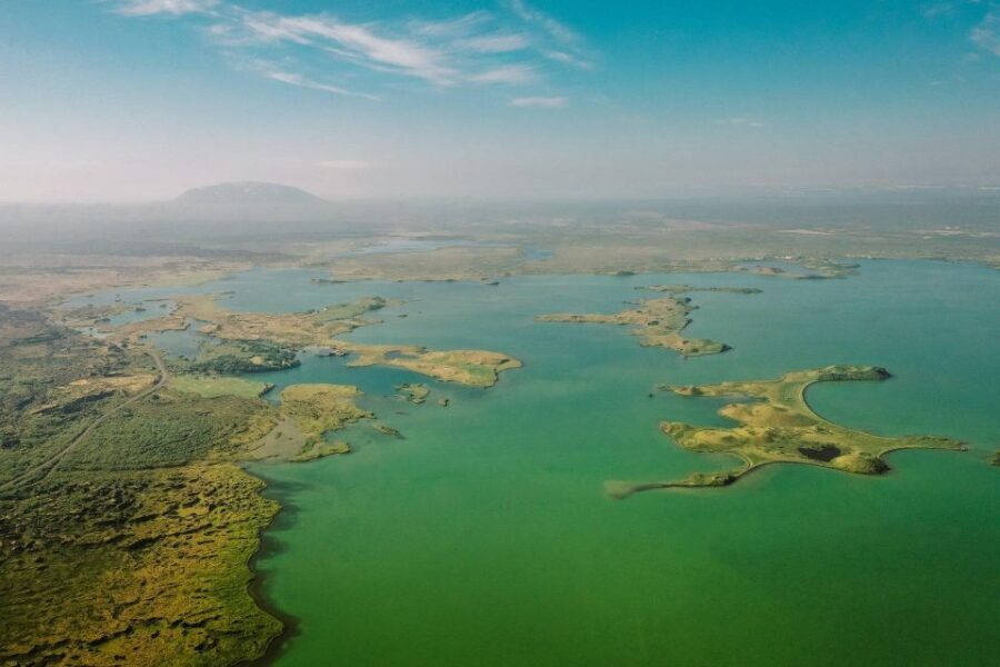 Port Akureyri: Godafoss Waterfall, Myvatn and Baths Tour - Grjótagjá cave and the hot blue river scene