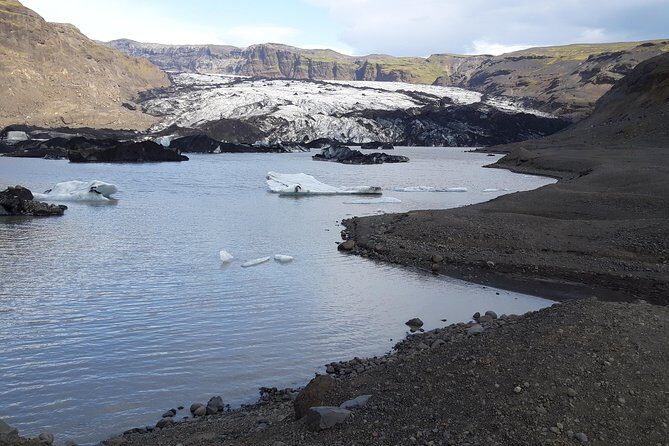 Private South Coast Tour from Reykjavik - Reynisfjara black sand beach: stark beauty and strong North Atlantic energy