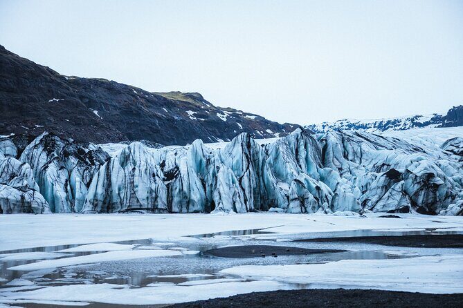 Private South Coast with Glacier Hike in Iceland - Reynisfjara black sand beach: a different Iceland mood