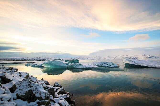 Reykjavik: Glacier Lagoon, Diamond Beach & South Coast Day Tour - Vík and Reynisdrangar: black sand village views and basalt drama