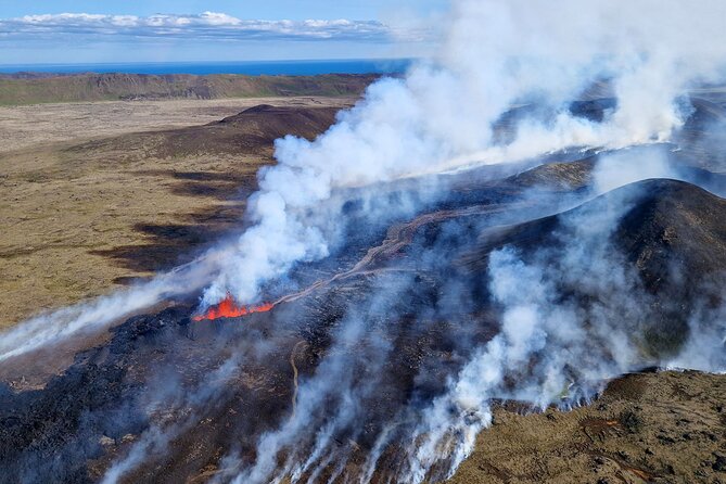 Reykjavik Helicopter Private Tour of Volcanoes - Coastal cliffs, seabirds, and the Atlantic to the south