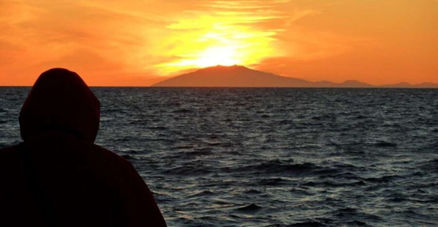 Reykjavik: Midnight Sun Whale Watching Tour - Before Boarding: Whale Watching Center and the Warm-Overalls Advantage