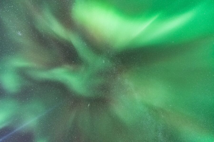 Reykjavik: Northern Lights Group Tour with Photos - From Reykjavik pickup to aurora-ready focus