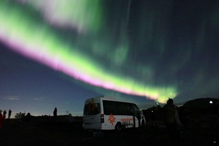 Reykjavik: Northern Lights Group Tour with Photos - The aurora center stop: mythology and science before you stare upward
