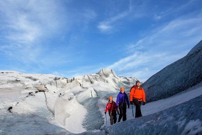 Reykjavik: South Coast, Waterfalls & Glacier Hike Small-Group - Reynisfjara black sand beach: basalt columns, sea stacks, and sneaker-wave rules