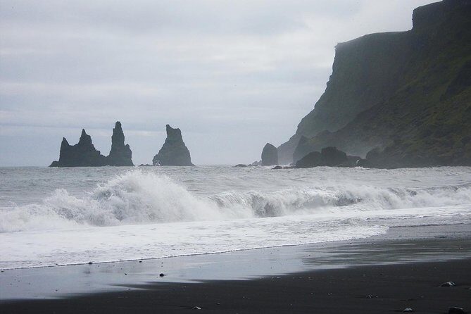 South Coast and Glacier Lagoon Day Trip by Super Jeep from Reykjavik - Skaftafell and Svínafellsjökul: stepping to the glacier edge near Vatnajökull