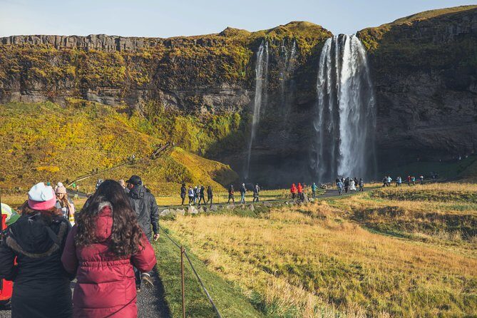 South Coast Day Tour Black Sand Beach & Waterfalls from Reykjavik - Solheimajokull Glacier Edge Walk: Touch the Ice, Then Keep Moving
