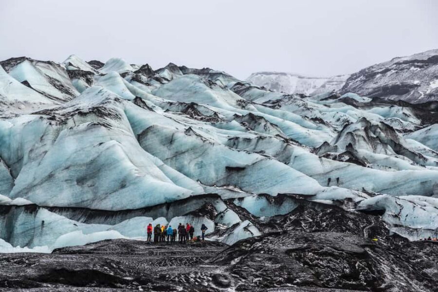 South Coast, Glacier Hike and Northern Lights Winter Tour - Reynisfjara Black Sand Beach and Reynisdrangar: Basalt, Cliffs, and Sea-Level Drama