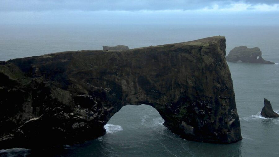 South Coast of Iceland. Black beach, glaсier, waterfalls... - Reynisfjara black sand beach near Vík: sea stacks and Atlantic force