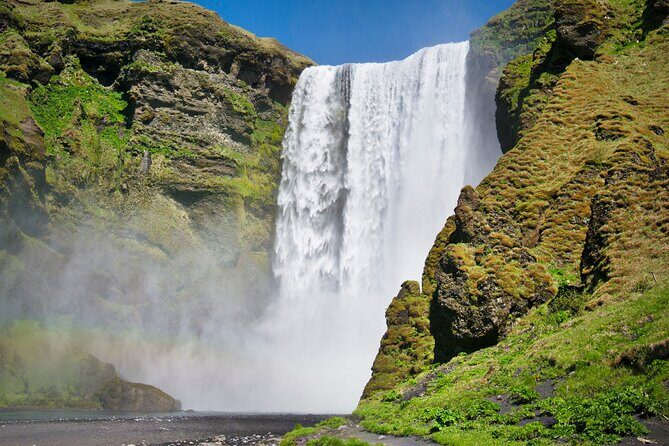 South Coast Private Guided Tour + Blue Lagoon(optional) - Skógafoss: Size, sound, and stairs for the best views