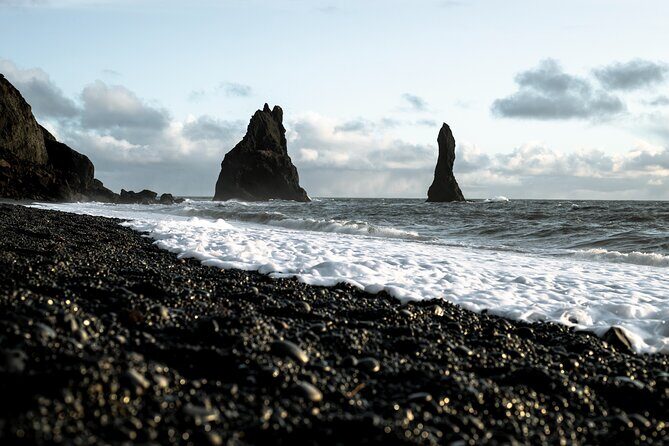 South Iceland Highlights and Northern Lights Combo Full-Day Tour - Reynisfjara Black Sand Beach: Stunning Geology With Creeper Wave Warnings
